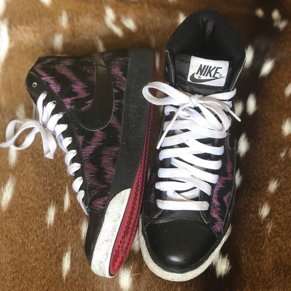 black and purple nike high tops